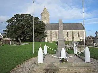 The church of Saint-Laurent d'Écoquenéauville and the war memorial