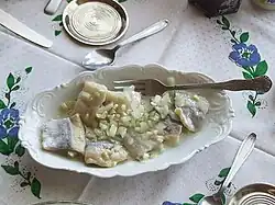 Śledzie – herring in oil with onions
