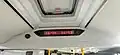 The scoreboard in the passenger compartment of the NefAZ commuter bus-5299-31-52 . The nameplate is located below on the left