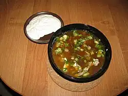 Kvass is added to the mixture.