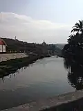 View of Dwenagara Golden Pagoda and Mong La from China