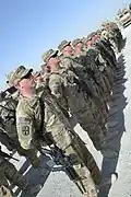 Soldiers with the 1487th Transportation Company-Ohio National Guard earn the Shoulder Sleeve Insignia Former Wartime Service, April 28, at Kandahar Airfield, Afghanistan.