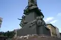 Lion among the debris of the barricades, representing the defense