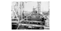 Photographed in 1873, construction of the Miramichi Bridges on the Intercolonial Railway - Northwest Branch; Dredge Pumps in operation in Pier B; built by Hugh Ryan and his firm Brown, Brooks & Ryan.