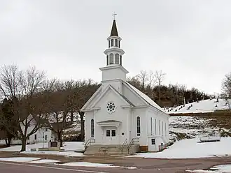 The Church of St. Thomas was built in 1870 as focal point of state's oldest Irish farming settlement, established in the 1850s, and is listed on the National Register of Historic Places.[1]