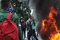 A university students speaks his aspirations through a megaphone