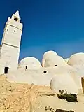 Graves and minaret of Mosquée de Sept Dormants in Chenini, Tunisia