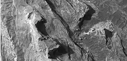 Close up of top of light toned butte, as seen by HiRISE under HiWish program.