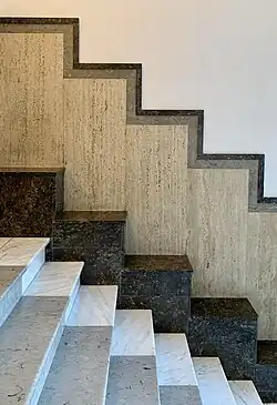 Polychrome marble facing in the entrance hall of Strada Pitar Moș no. 27–29, Bucharest, by Sady Herivan, 1931-1933[93]