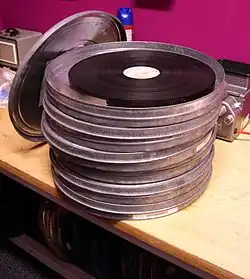A 35 mm release print in the form that it would typically be delivered to a theatre in Europe. Each can contains roughly 2,000 feet of film, or 20 minutes of running time at 24 fps.