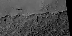 Close view of mantle, as seen by HiRISE under HiWish program Location is Hellas quadrangle.