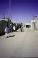 Douz street view with motorcyclist, 1997