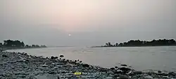 A misty sunrise over the Indus River as it flows past Hund village in Khyber Pakhtunkhwa, Pakistan.