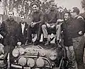 Hopkirk (second on the right) at the 1965 1000 Lakes Rally