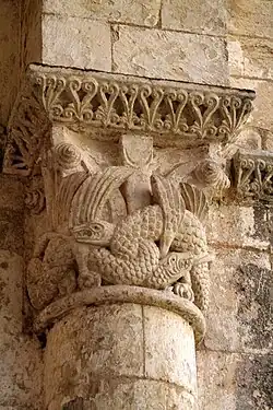 Capital decorated with intertwined beasts derived from Insular art. Grande-Sauve Abbey, France