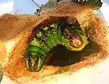 Cocoon cut away to show prepupa stage