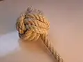 a larger monkey's fist formed with a thicker rope
