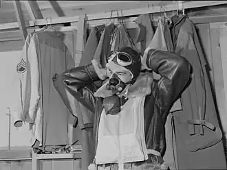 A U.S. airman donning oxygen apparatus, 1942