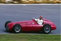 1951: The Alfa Romeo 159 being driven at the Nürburgring.