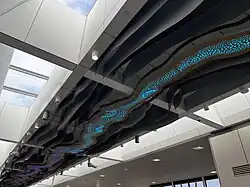 Artwork on a ceiling as described in the following paragraph