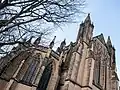 View of the east end including chapel apse, east window and towers