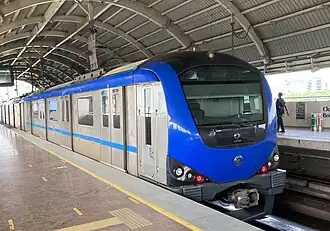 A metro train at Guindy station on the Blue Line
