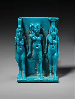 Amulet which depicts a triad of Isis, Horus and Nephthys; 664–332&nbsp;BC; faience; height: 4.5&nbsp;cm, width: 3&nbsp;cm, depth: 2.2&nbsp;cm; Metropolitan Museum of Art (New York City)