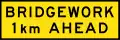 (T1-29) Bridgework 1&nbsp;km ahead