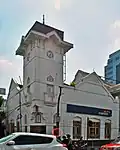 The same building in 2014, a branch of Bank Mandiri