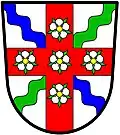 a bendlet sinister—Argent, a bendlet wavy azure and a bendlet sinister wavy vert, over all on a cross gules five roses argent barbed and seeded proper—North Yorkshire County Council, England