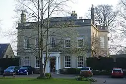 Bicester Manor House, a large, classical styled building with large windows