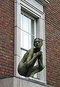 Birdy (bronze), 1997. Height 122&nbsp;cm. Perched on the windowsill of 3, Crescent Hall, Mount Street, Dublin.