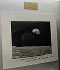 An Earthrise photograph inscribed and signed by Frank Borman