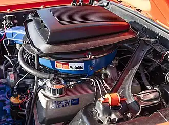 Ford Boss 302 Engine With Shaker scoop. Factory Finned Aluminum valve covers unique to canted valve Boss 302 engine.