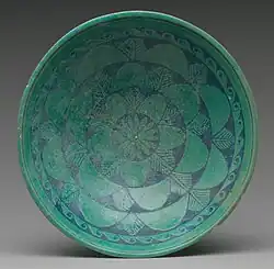 Ancient Egyptian bowl; 200–150&nbsp;BC; faience; 4.8&nbsp;cm ×&nbsp;16.9&nbsp;cm (1.9&nbsp;in ×&nbsp;6.7&nbsp;in); Metropolitan Museum of Art (New York City)