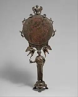 Mirror with a support in the form of a draped woman; mid-5th century BC; bronze; height: 40.41&nbsp;cm; Metropolitan Museum of Art