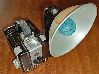 Kodak Brownie Hawkeye with "Kodalite Flasholder" and Sylvania P25 blue-dot daylight-type flashbulb