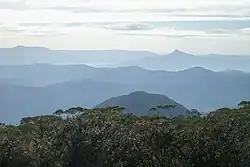 As seen from Mount Budawang, (Pigeon House on right horizon)