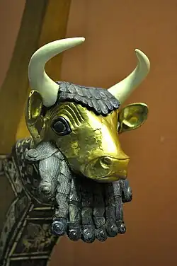 Sumerian volutes at the end of the strands of a bull mascaron of the queen's lyre, one of the Lyres of Ur, 2600 BC, wood, lapis lazuli, limestone (red), bitumen, gold, shell, British Museum[16]