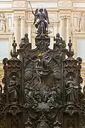 The upper part of the episcopal throne of the choir, featuring a life-size representation of the Ascension