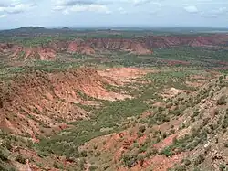 Side canyon carved by erosion.