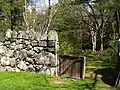 Stone wall with gate.