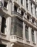 Stained glass windows facing Calle del Clavel