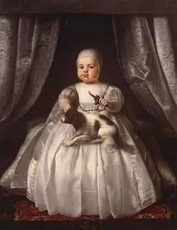Charles II of England, before he was "shortcoated", holding a teething coral, 1630