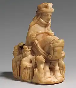 A 13th century Queen astride a horse with attendants, of Scandinavian origin. The Queen replaced the Persian Vizier in European chess.