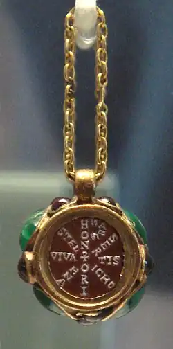 Christian pendant of Maria (398–407), wife of the Emperor Honorius (r. 395–423), with text in the shape of a Chi-Rho, Louvre.