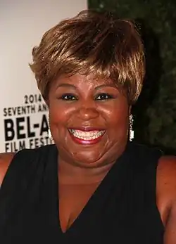 A closeup of a woman.