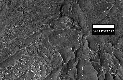 Close-up of fretted terrain near Reull Vallis, as seen by HiRISE. This area would be a challenge to walk across.