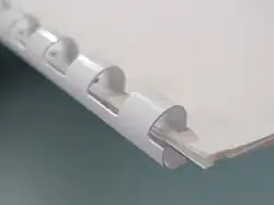 Completed book out of machine