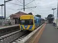 A Comeng train on a Craigieburn-bound service arrives at Platform 2, October 2024